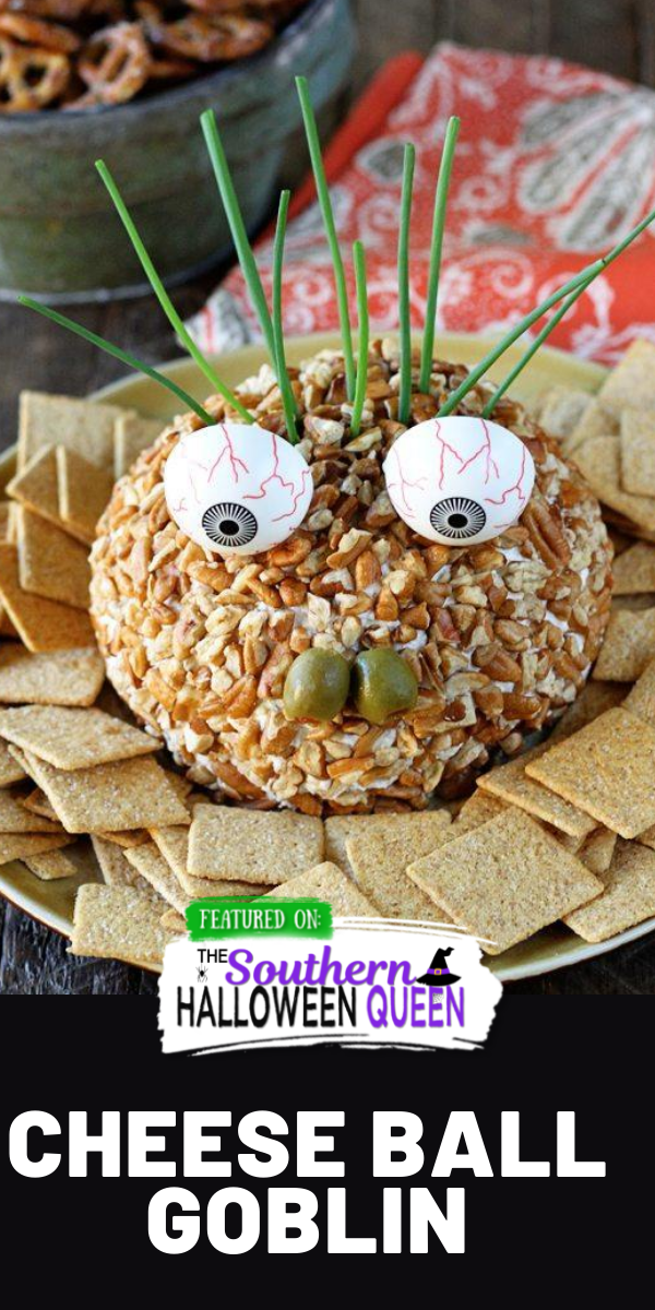 This is the perfect snack/appetizer to add to your Halloween party spread!  Turn Stacey's hugely popular Ranch Chicken Cheese Ball into this fun and festive Cheese Ball Goblin! via @southernhalloweenqueen