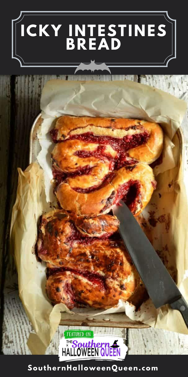 Icky Intestines Bread is Puff pastry that has been filled with sweet cream cheese and raspberry sauce! Then it's rolled up into large and small intestine shapes and baked for a sweet breakfast or dessert icky good Halloween treat. via @southernhalloweenqueen