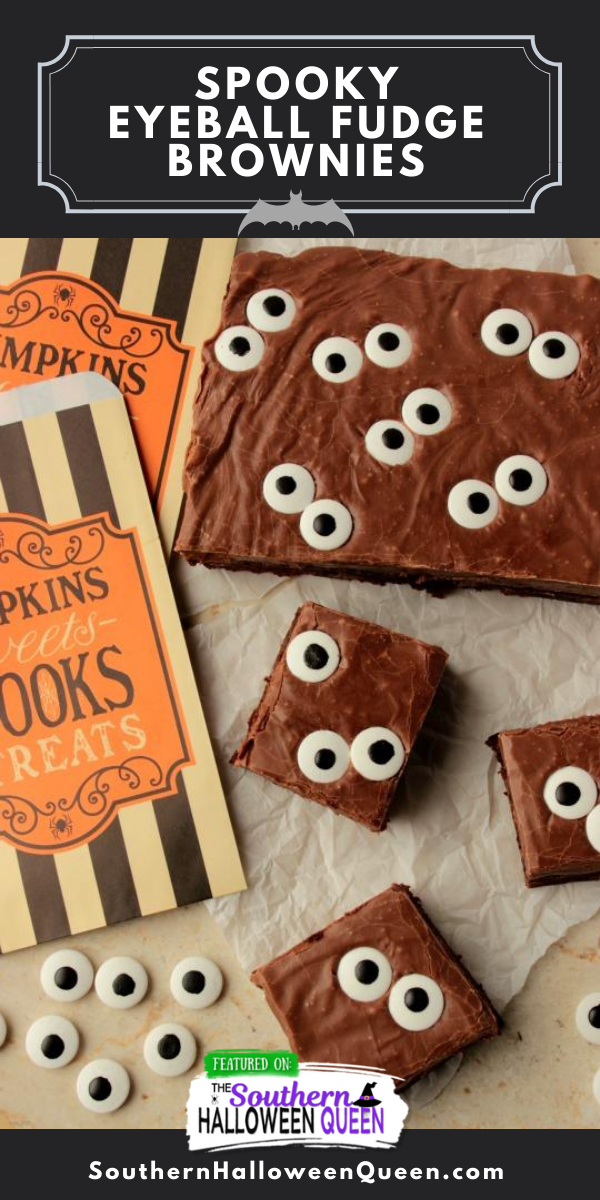 Spooky Eyeball Fudge Brownies - Super easy brownies with a fudge topping and candy eyes make up these Spooky Eyeball Fudge Brownies! via @southernhalloweenqueen