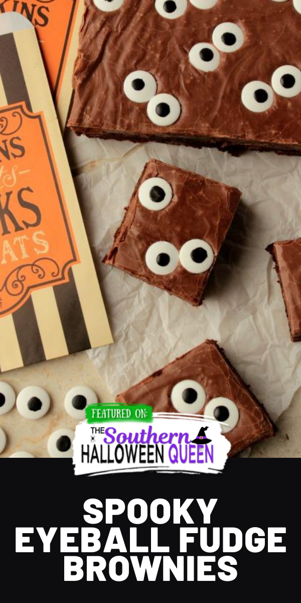 Spooky Eyeball Fudge Brownies - Super easy brownies with a fudge topping and candy eyes make up these Spooky Eyeball Fudge Brownies! via @southernhalloweenqueen