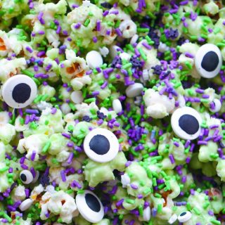 Monsters have never tasted so sweet! This ghoulishly green Monster Popcorn Snack Mix is packed with eyeballs, sprinkles, and spooky charm. Perfect for parties, movie nights, or snacking while haunting the neighborhood!
